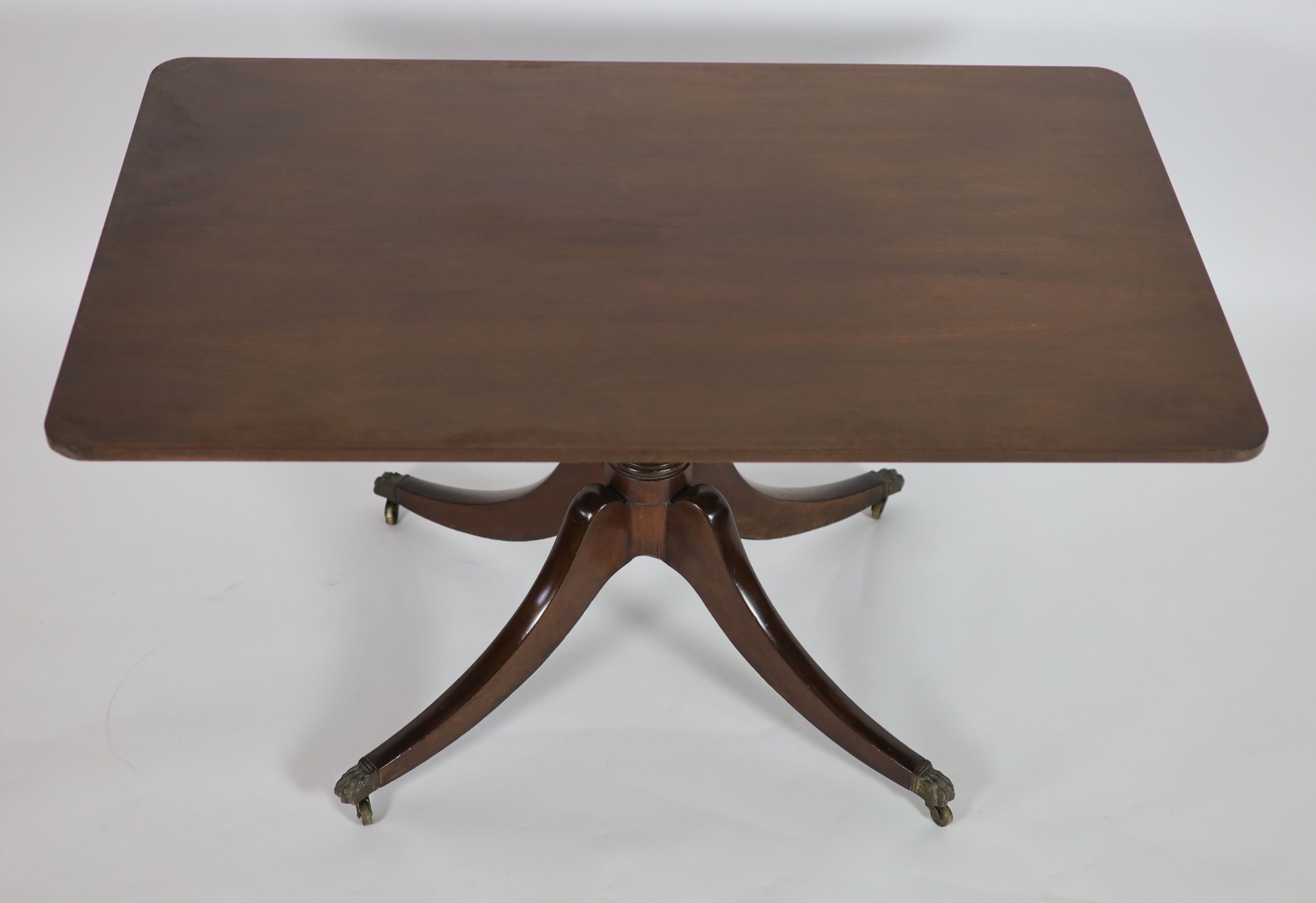 A Regency rectangular mahogany tilt top dining table, width 130cm, depth 80cm, height 72cm